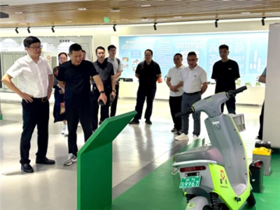 Ledere fra Foshan-Maoming Pairing Assistance and Cooperation-hovedkvarter i G...